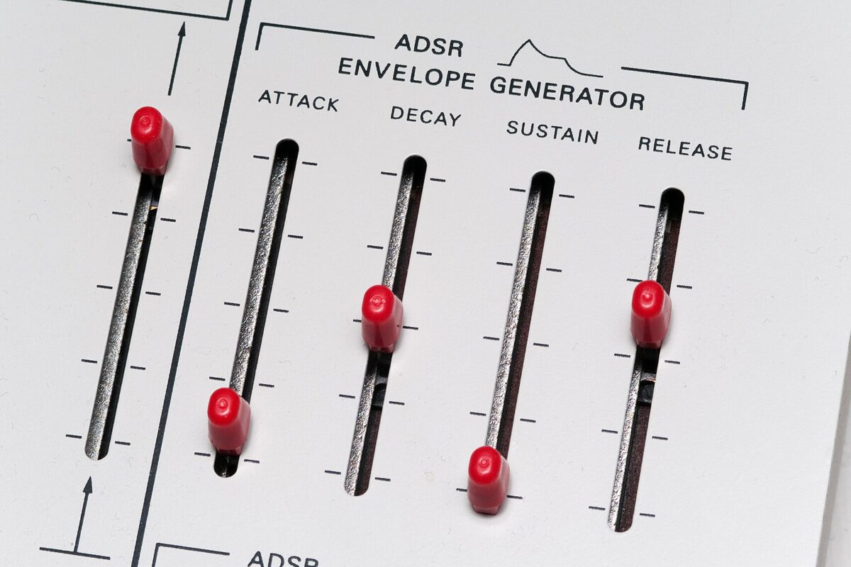 ADSR envelope sliders on the panel of a Korg ARP Odyssey