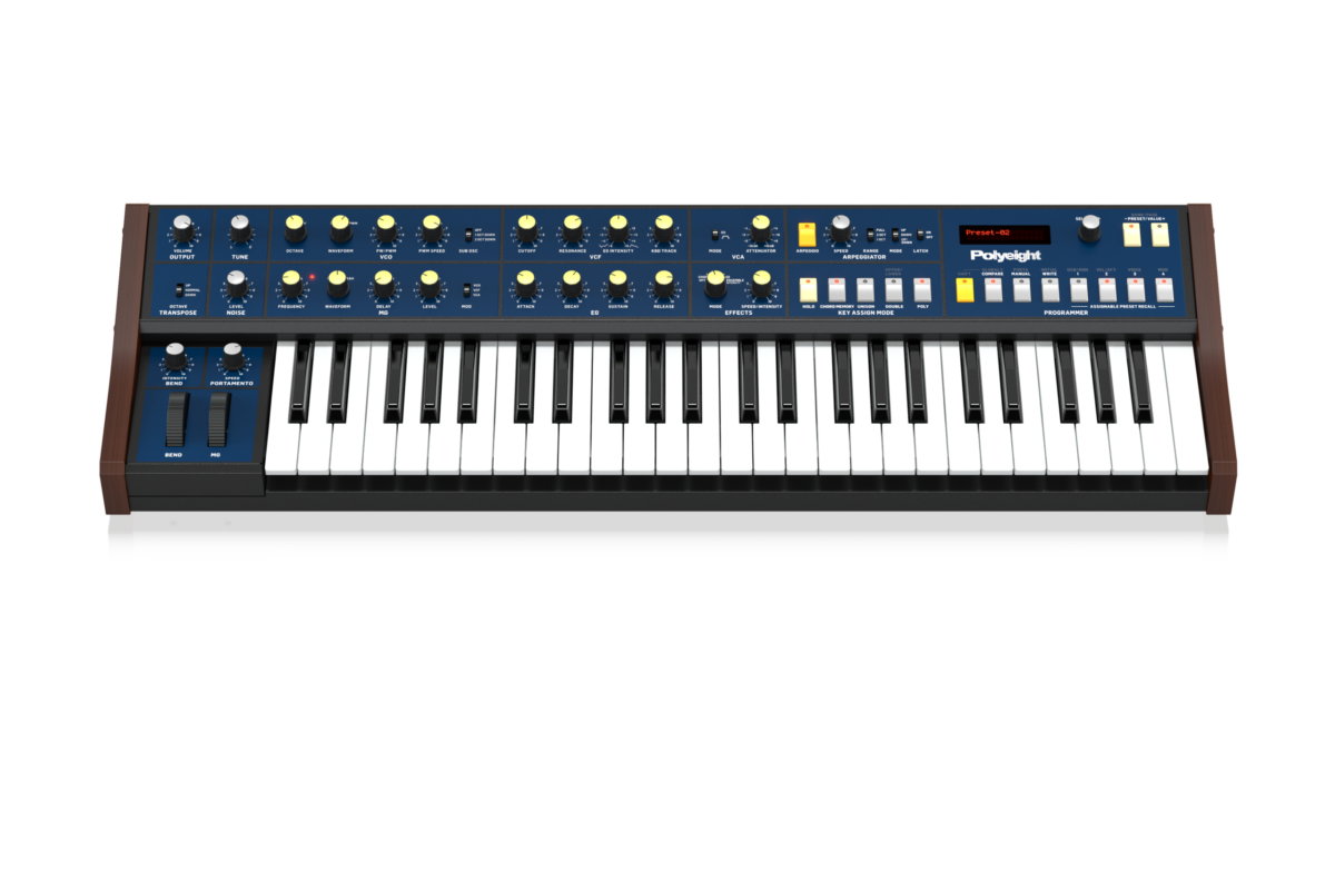 The Behringer Polyeight synthesizer seen from the front at an angle, 49-key keyboard and knob-covered panel